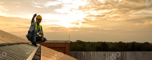 Preview: Engineer service check installation solar cell on the roof of factory.