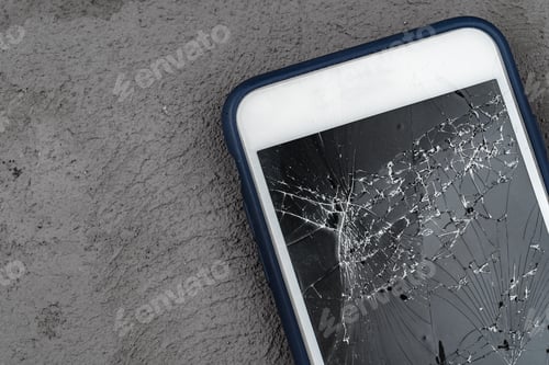 Preview: Mobile smartphone with broken screen close up