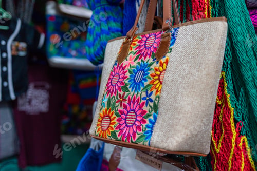 Preview: Colorful Embroidered Flower Detail Fabric Tote Bag Displayed For Sale