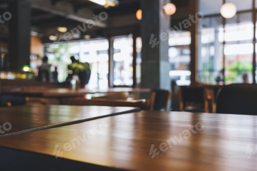 Preview: Wooden table top with blurred background in cafe