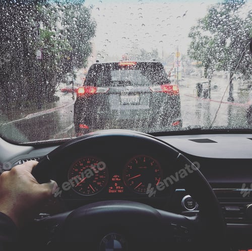 Preview: Driving a car in the rain on a rainy day
