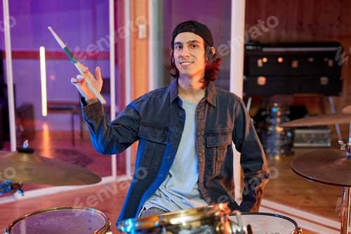 Preview: Portrait of Young Drummer in Studio