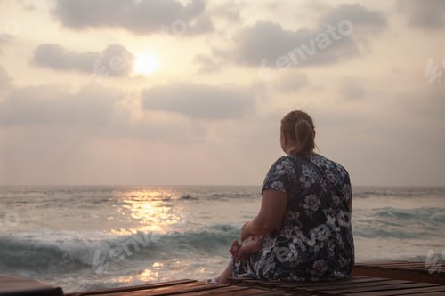 Preview: Mom and little daughter on the tropical coast of the Indian Ocean on sunset