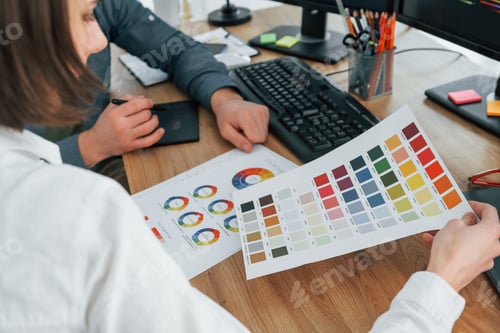 Preview: Creative occupation. Two designers working together in the office
