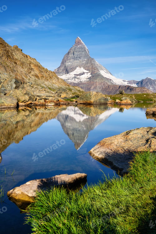 Preview: Matterhorn and reflection on the water surface at the morning time. Swiss natural landscape
