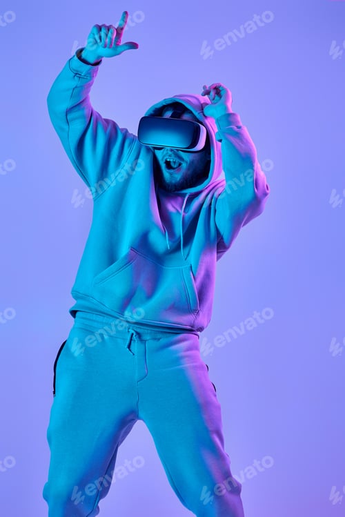 Preview: man using virtual reality glasses and playing video games