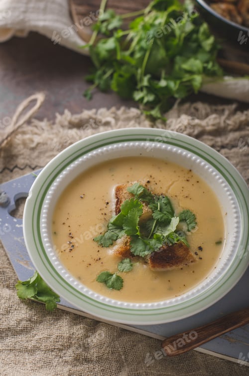Preview: Creamy mushroom soup with fresh herbs garlic croutons