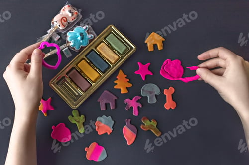 Preview: Making edible marzipan figures with your hands and cookie cutters to decorate baking.