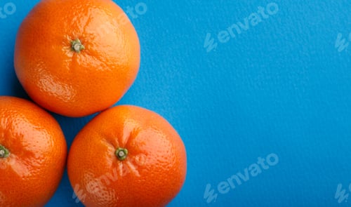 Preview: Ripe Mandarin Close-Up On A White Background. Tangerine Orange. Colorful Food And Drink Still Life