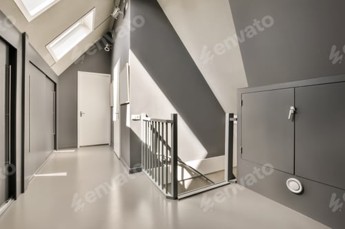 Preview: a long white hallway with stairs and a metal railing