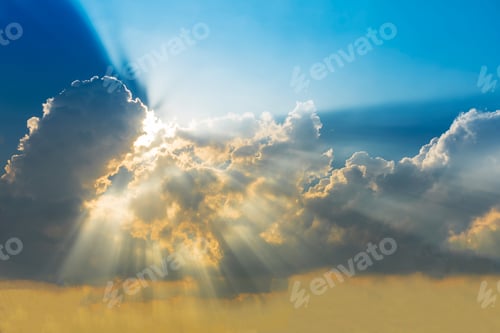 Preview: Golden Sun Rays Shining Through Cumulus Clouds