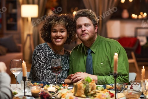 Preview: Happy couple having a date at dining table