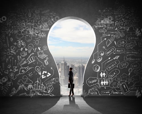 Preview: Silhouette Of Businesswoman Against Black Wall With Key Hole