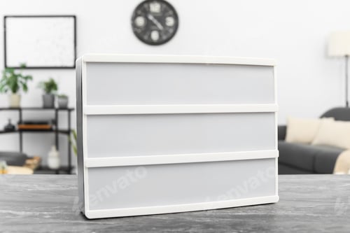 Preview: Blank letter board on grey table indoors