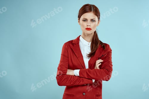 Preview: Elegant woman in red jacket bright makeup lips self-confidence cropped view blue background