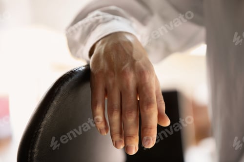 Preview: Close up of caucasian male hands, working in office, business, people