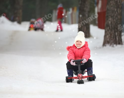 Preview: Little Boy And Girl Slides Down From The Snow Hill On A Sledge