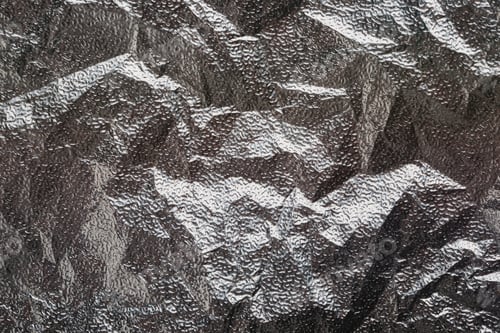 Preview: Silver crumpled foil textural background