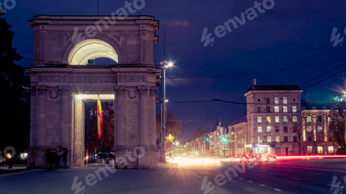 Preview: Arch and street with cars in the evening in Chisinau