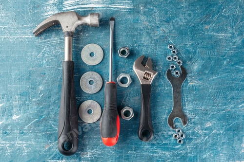 Preview: different construction tools on blue background