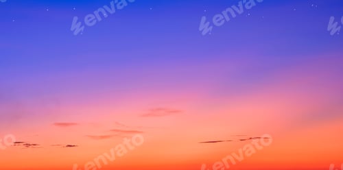 Preview: Colorful romantic dusk sky with stars on majestic orange and dark blue twilight sky background