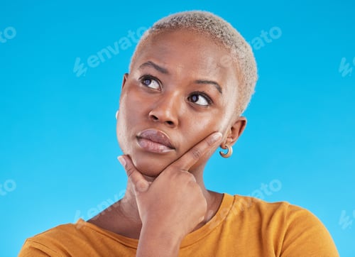 Preview: Thinking, decision and black woman with ideas, opportunity and planning on a blue studio background