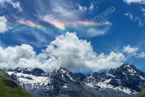Preview: Iridescent cloud over the road to Stelvio pass (Lombardy) at summer