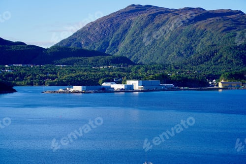 Preview: Street view in Roros, Norway, showcasing colorful wooden buildings and a tranquil atmosphere.