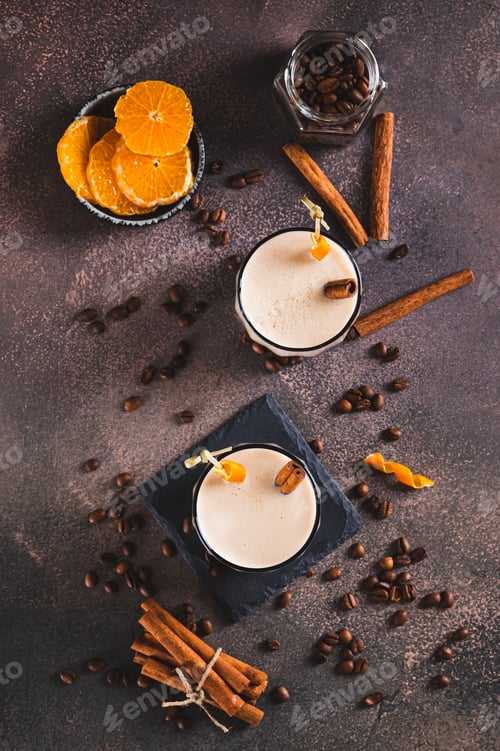Preview: Carajillo cocktail of espresso and liqueur in glasses on table top and vertical view