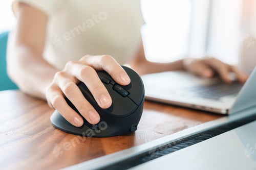 Preview: woman hand using computer ergonomic mouse