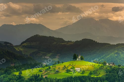 Preview: Landmark Church Stand Out at Hilltop in Julian Alps Landscape. Sveti Tomaz in Skofja Loka Slovenia