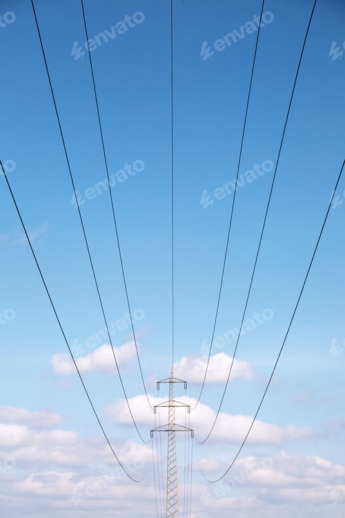 Preview: Low angle view of power lines under blue sky