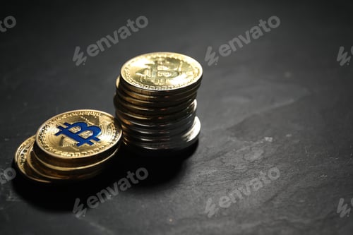 Preview: Cryptocurrency. Bitcoins on black table, closeup. Space for text