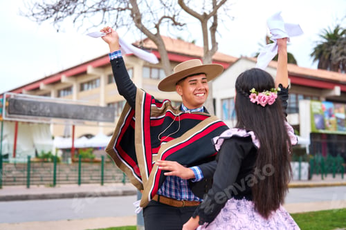 Preview: couple of huasos dancing Chilean cueca in the city square