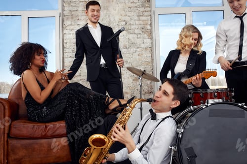 Preview: Young international musicians, a band performing on the loft stage. The concept of music, hobby