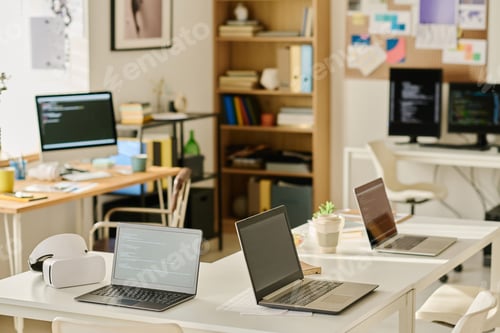 Preview: IT office with computers on workplaces of programmers