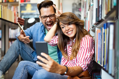 Preview: Students are studying together in library. Couple, study, technology, education love concept