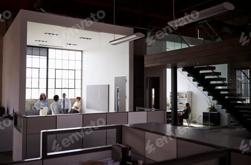 Aperçu: Business people working in office units seen from corridor
