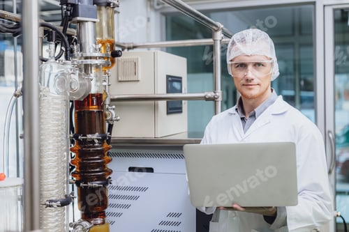 Preview: Portrait Scientist working with Equipment in Science Lab. Medical factory staff Cannabis CBD oil ext