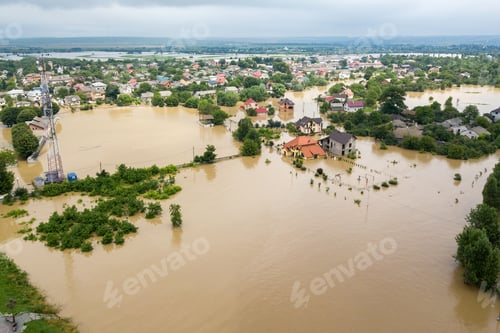 Preview: Aerial view of flooded houses with dirty water of Dnister river in Halych town, western Ukraine.