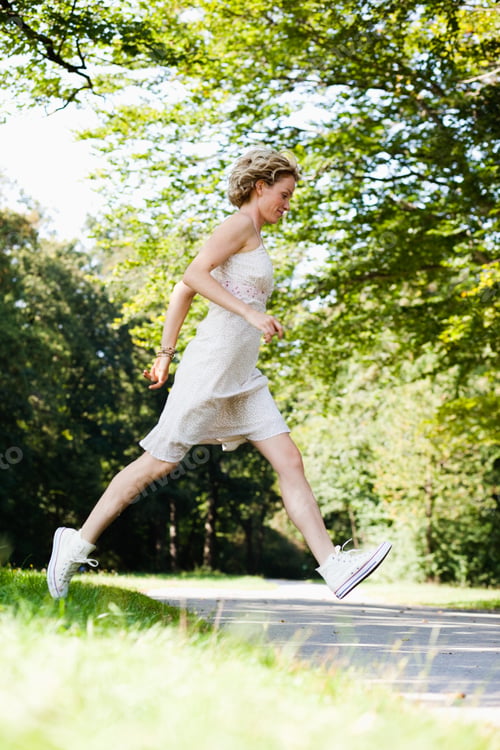 Preview: woman running in park