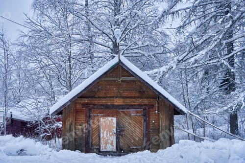 Preview: A barn in the snow covered village