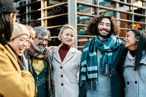 Preview: Group of diverse multi generational business people standing together outdoors