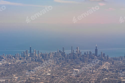Preview: Aerial view of Chicago Cityscape river side at the afternoon time which look through airplane