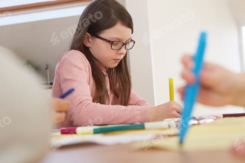 Preview: Girl drawing at table