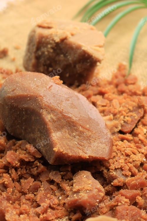 Preview: Jaggery traditional cane sugar cube on table