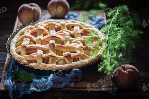 Preview: Closeup of fresh and homemade tart with peaches