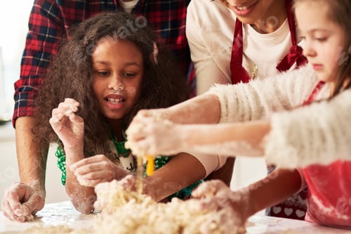 Preview: Close up of family in the kitchen