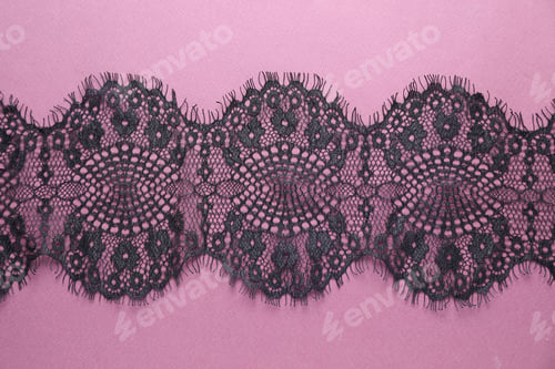 Preview: Black lace on purple background, top view