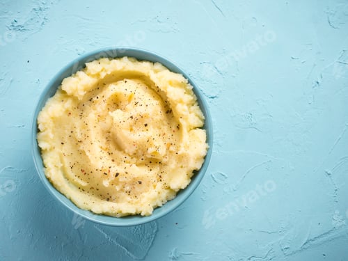 Preview: Mashed potatoes on blue concrete background
